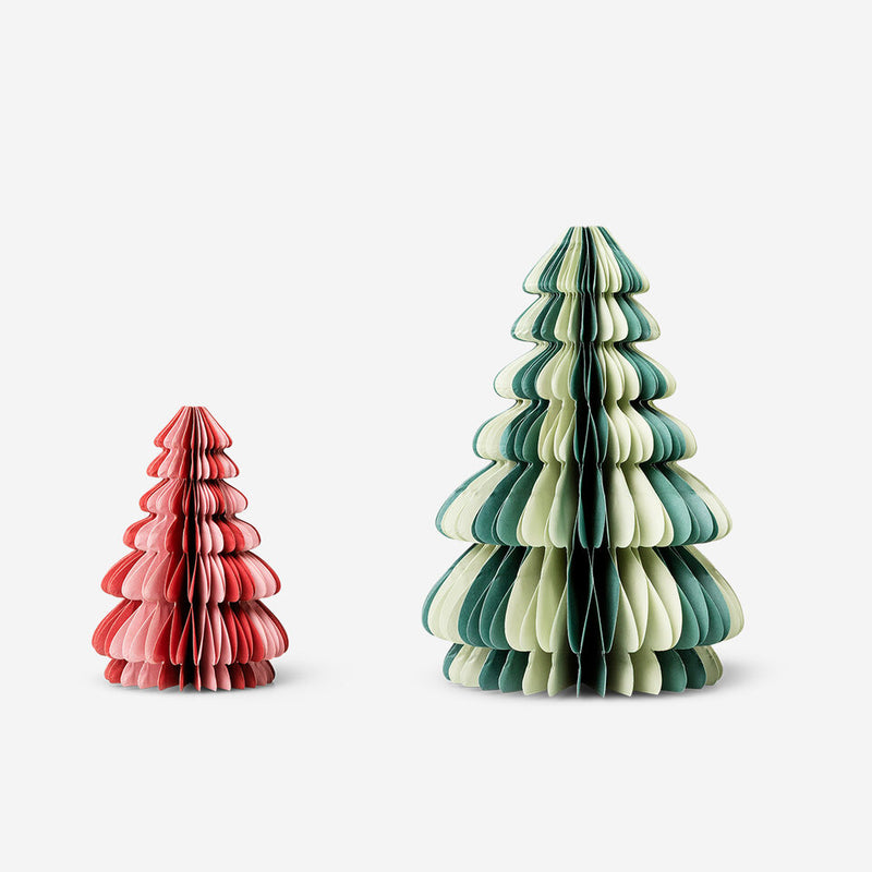 Two paper honeycomb Christmas trees, one small and red and the other larger in shades of green, displayed side by side on a plain white background.
