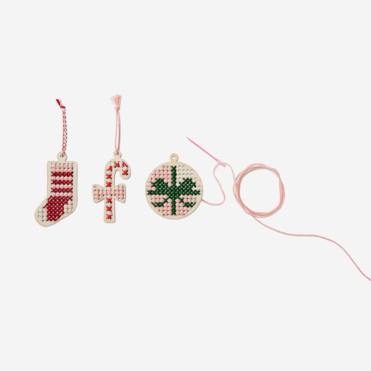 Christmas cross stitch embroidery kit by Flying Tiger Copenhagen featuring festive patterns and colorful threads for holiday craft.