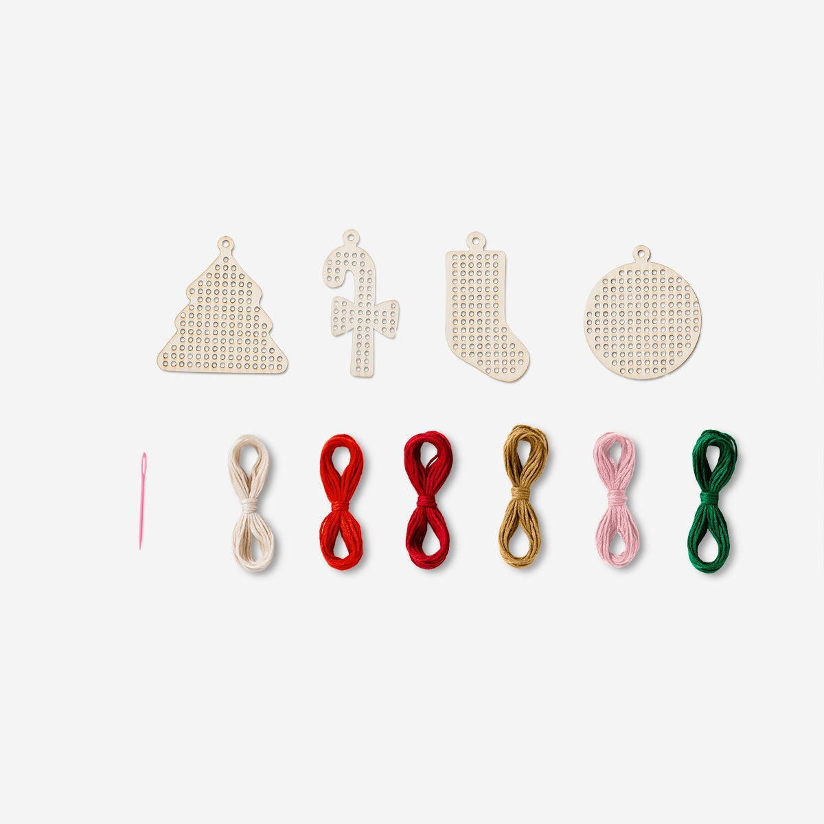 Christmas cross stitch embroidery kit by Flying Tiger Copenhagen featuring colorful threads and festive design for holiday craft projects.