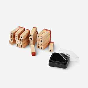 Letter stamps with ink pad from Flying Tiger Copenhagen for crafting and hobby projects, featuring alphabet characters and vibrant ink.