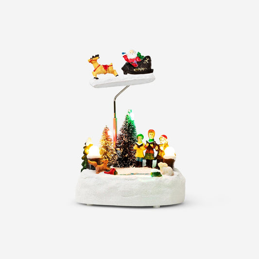 Scene for Christmas village. With light and music