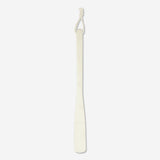 Flying Tiger Copenhagen shoe horn, a sleek and durable home accessory for easy shoe wear assistance.