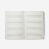 A5 office notebook by Flying Tiger Copenhagen with a simple cover, suitable for writing, note-taking, and organization.
