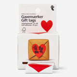 Set of 25 heart-shaped self-adhesive gift tags for parties by Flying Tiger Copenhagen, featuring bright red designs.