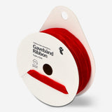Velvet ribbon for party decor by Flying Tiger Copenhagen, shown in deep red with a soft, plush texture.