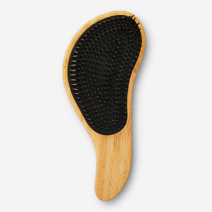 Flying Tiger Copenhagen detangler brush for personal care, with wide teeth for gentle hair detangling.