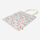 Textile tote bag from Flying Tiger Copenhagen with colorful design and sturdy handles, ideal for everyday use.