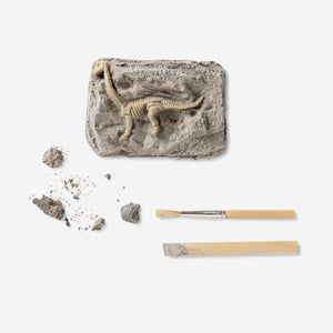 Flying Tiger Copenhagen excavation kit for fossils toy with tools and buried fossils for kids to discover and excavate.